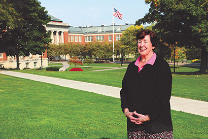 Photo of a woman on the SUNY Cortland campus. Link to Life Stage Gift Planner Over Age 70 Situations.