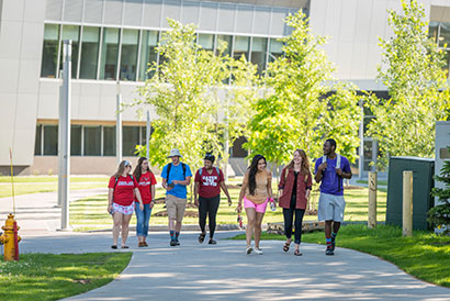 Photo of students on campus. Link to Gifts by Estate Note
